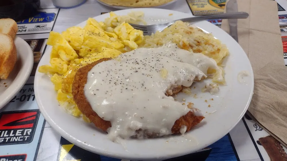 Country Fried Steak and Eggs Any Style